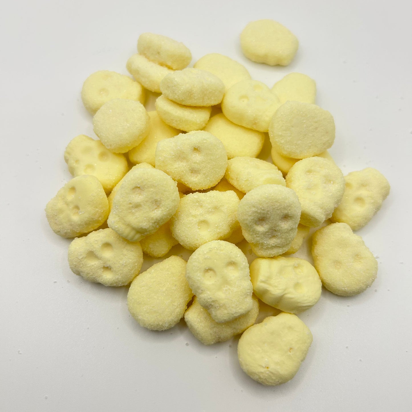 Yellow skull shaped foamy lollies
