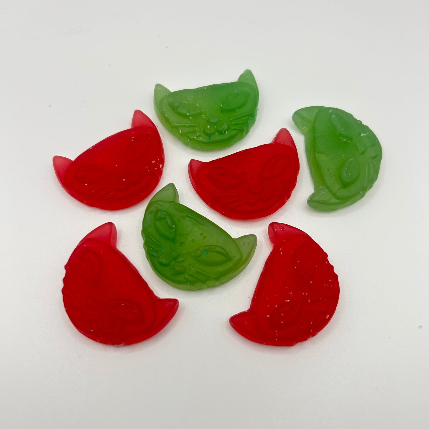 Red and green cat shaped lollies