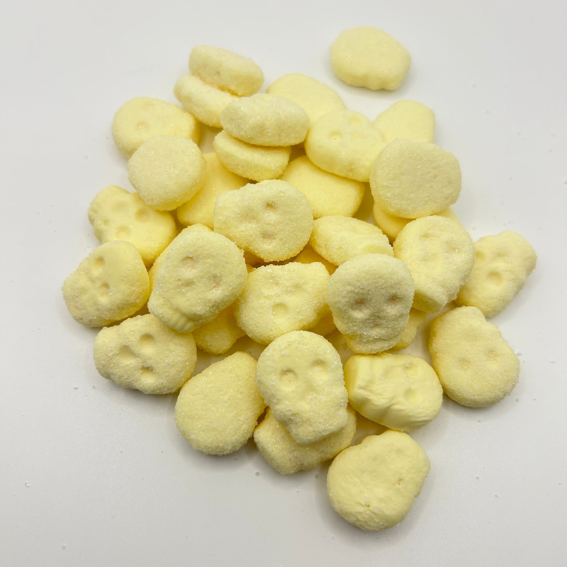 Yellow skull shaped foamy lollies 