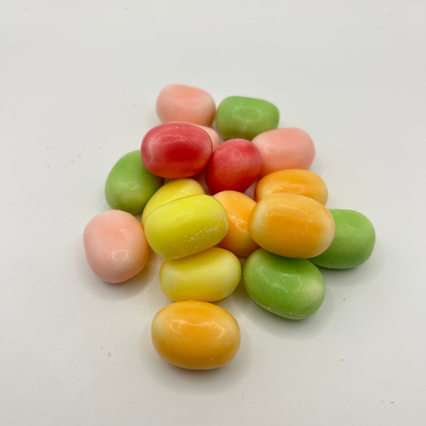 Colorful jelly beans on a white background